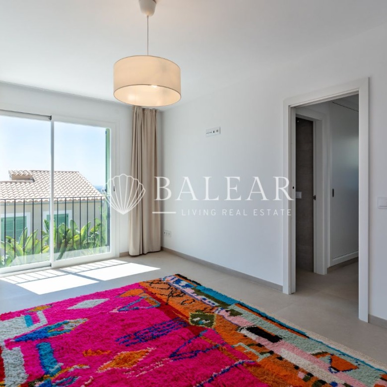 Dormitorio principal en casa Sa Cabaneta