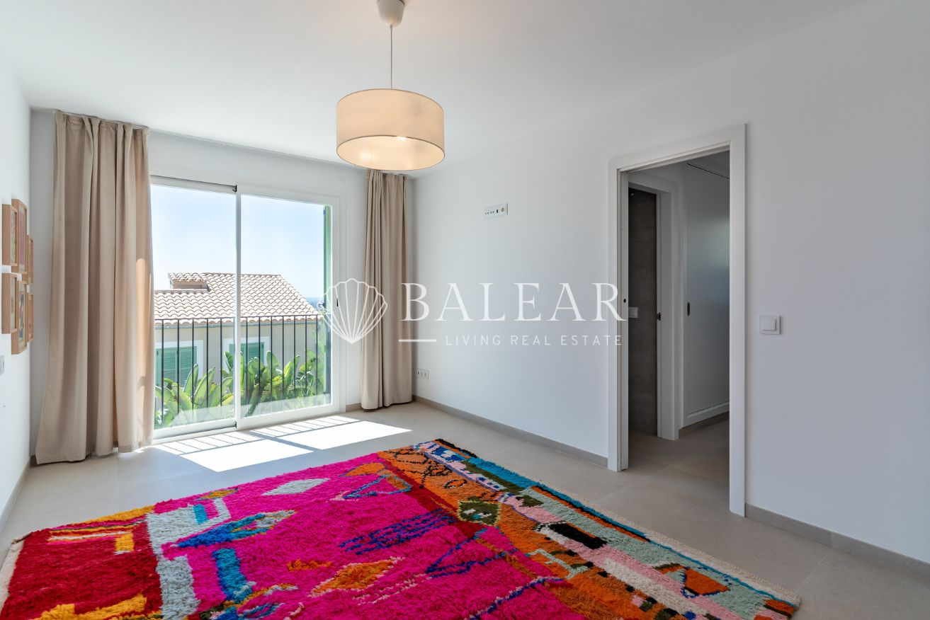 Dormitorio principal en casa Sa Cabaneta