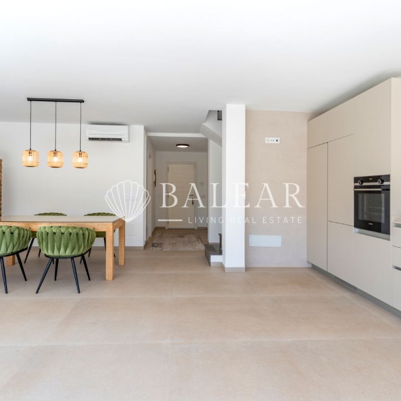 Comedor integrado en el salón del casa en Sa Cabaneta.